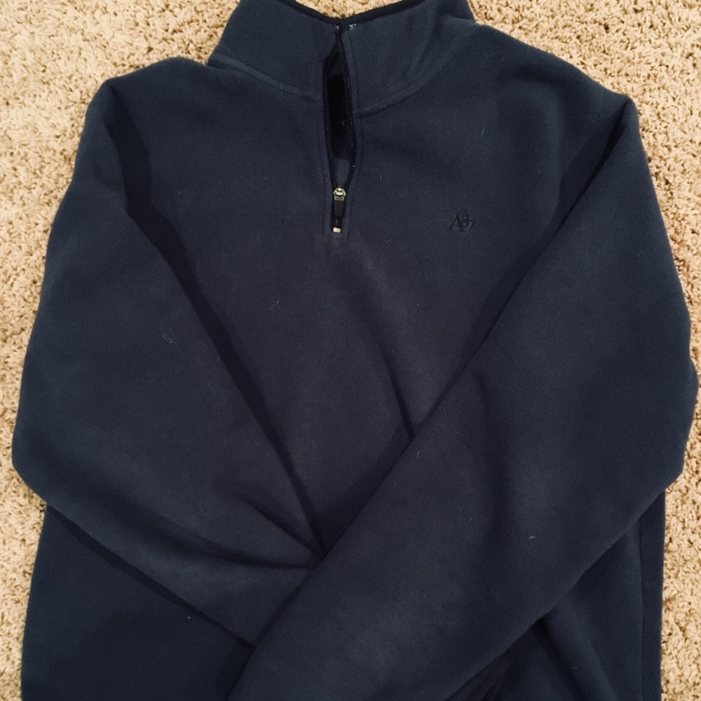 Men’s size large blue fleece jacket.